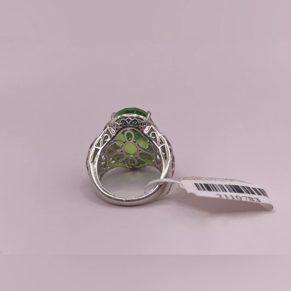 Simulated peridot in sterling silver with black rhinestone accents